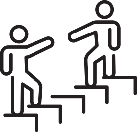 silhouettes of two figures facing each supportive while climbing stairs